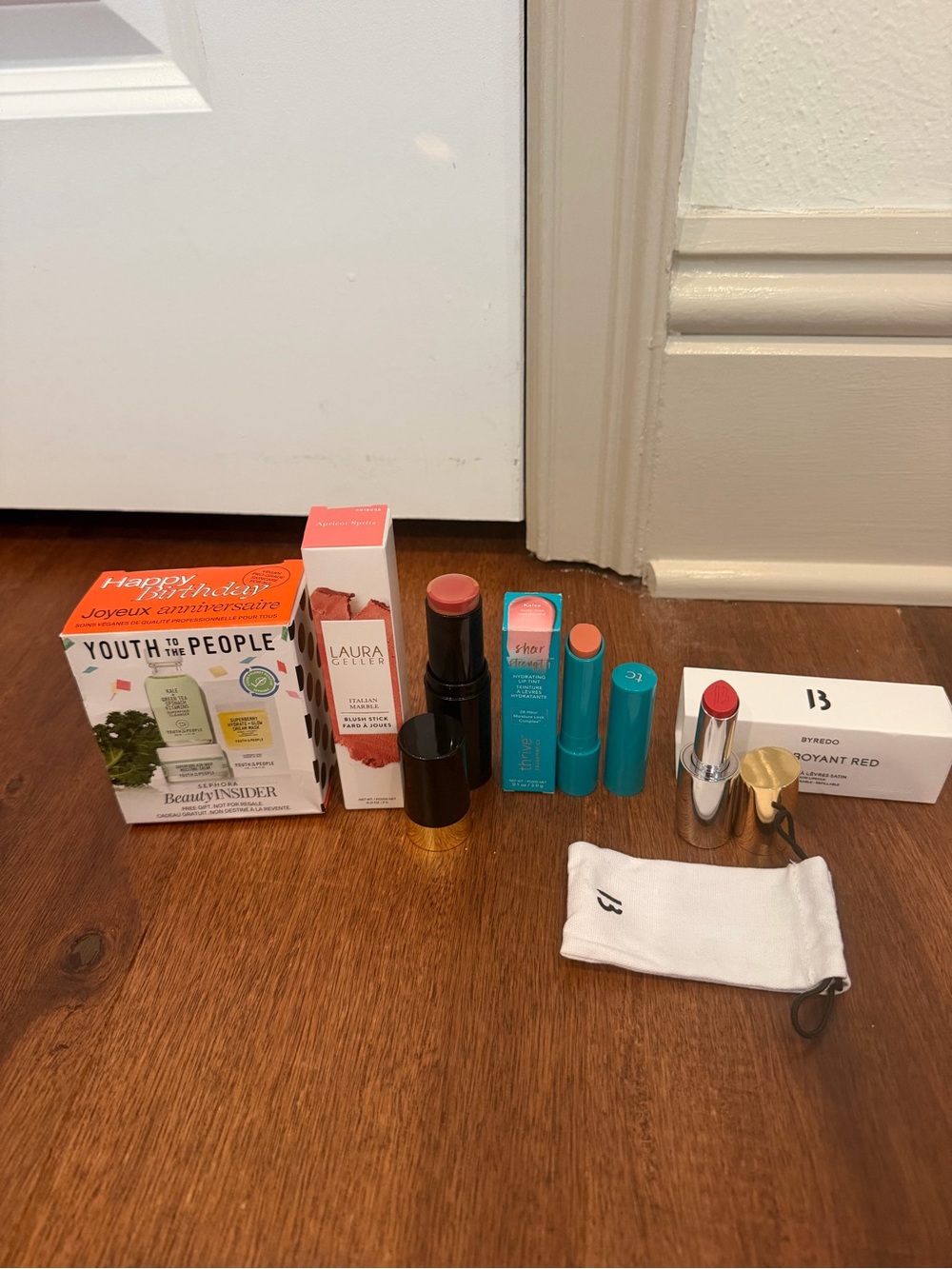Youth to the people set, Laura Geller blush, lippy, thrive lippy, Byeredo red li